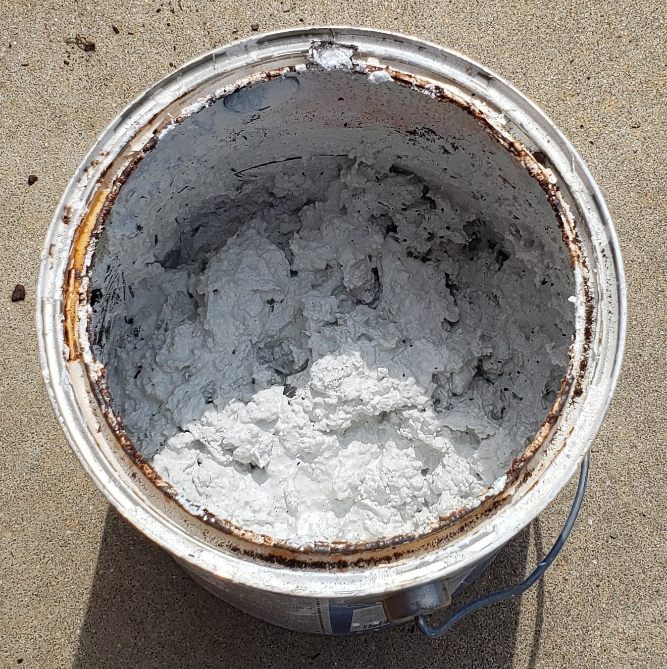 1 gallon paint can with hardened latex paint. No liquid remaining