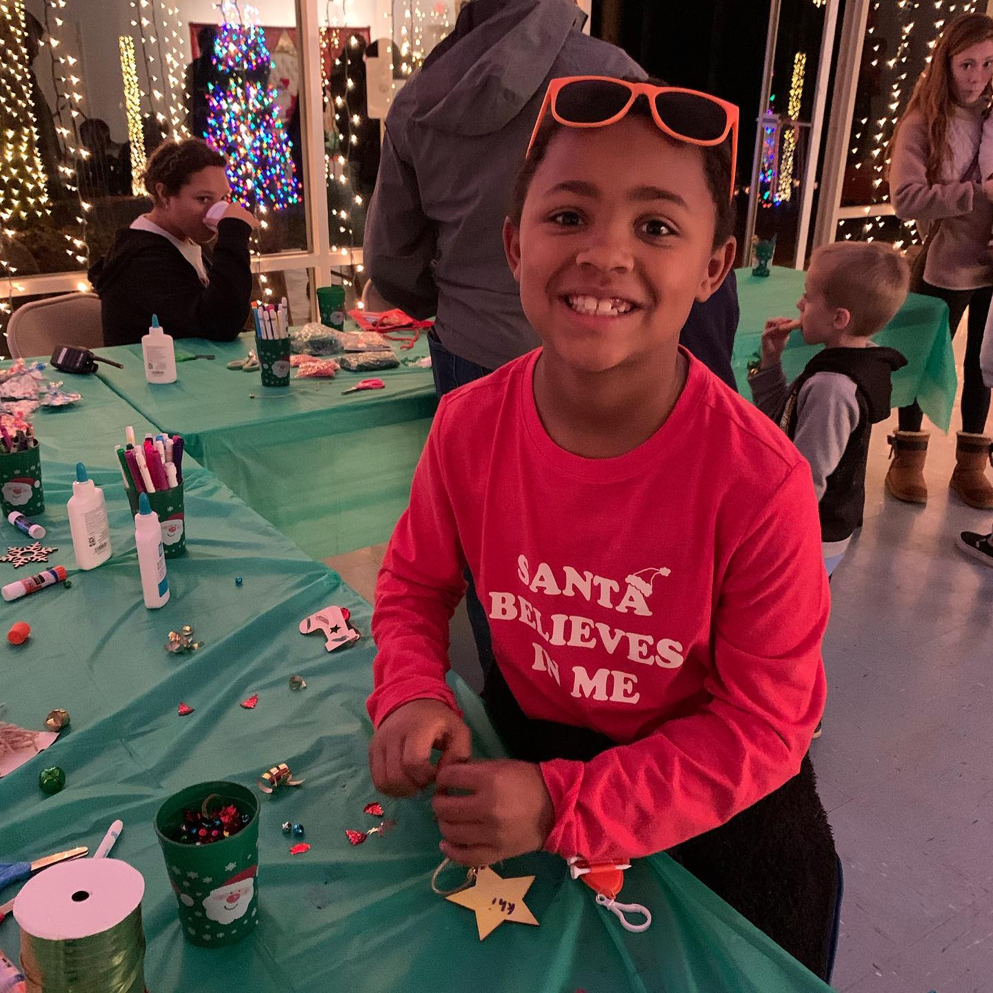 Holiday in the Park - Boy making a craft