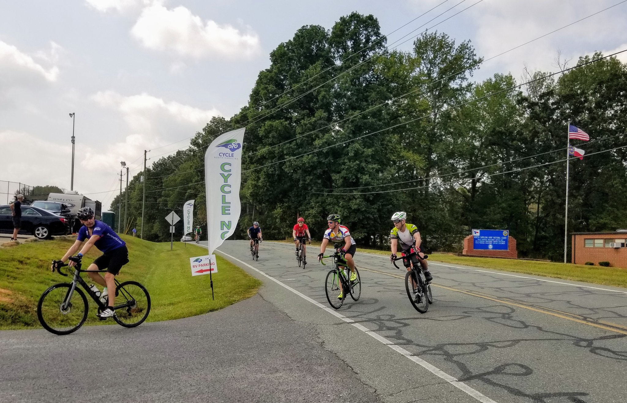 Bicyclists riding through Siler City for Cycle NC 2019