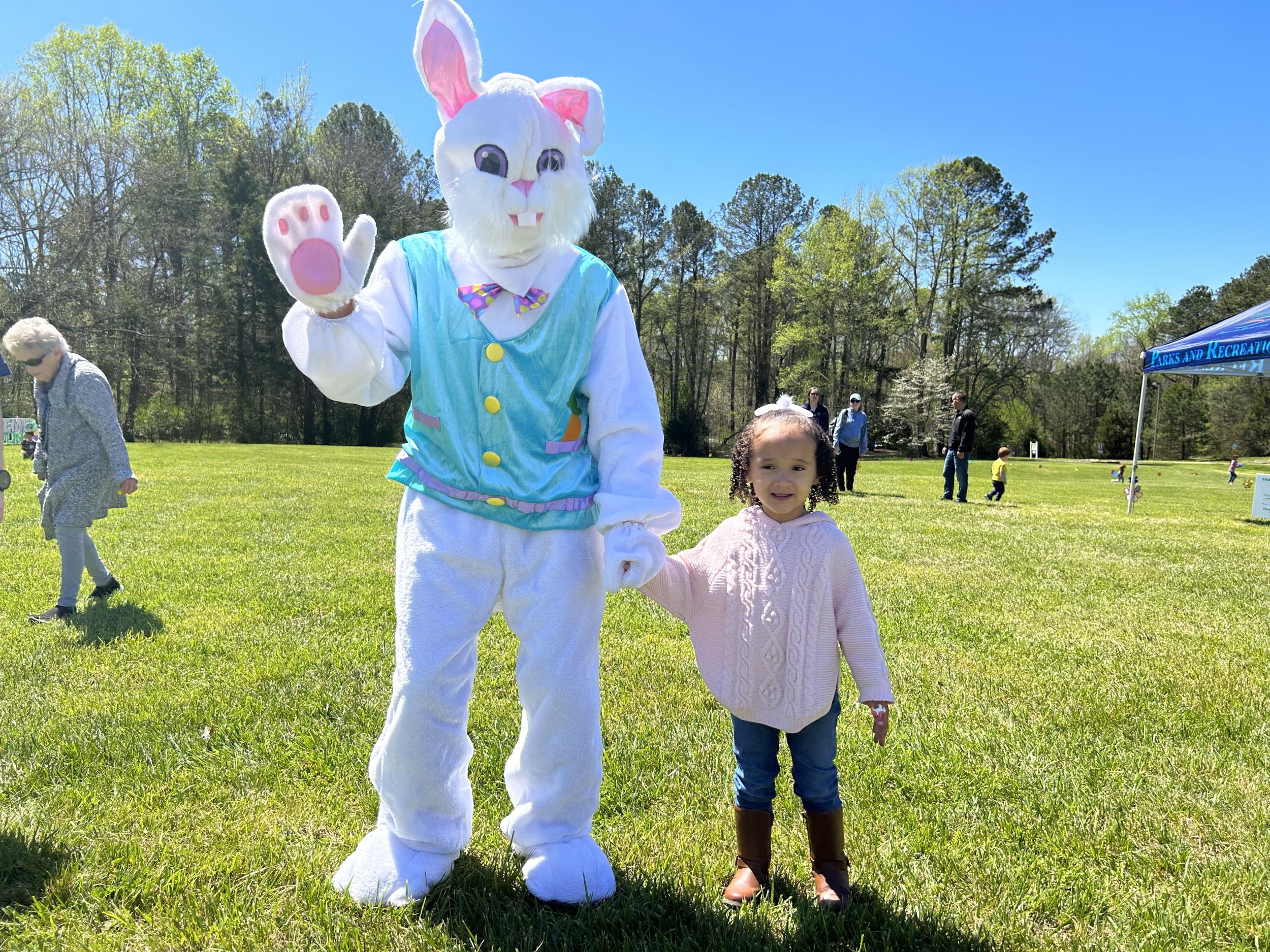 Easter Bunny with child at EGGstreme Spring Fling 2023