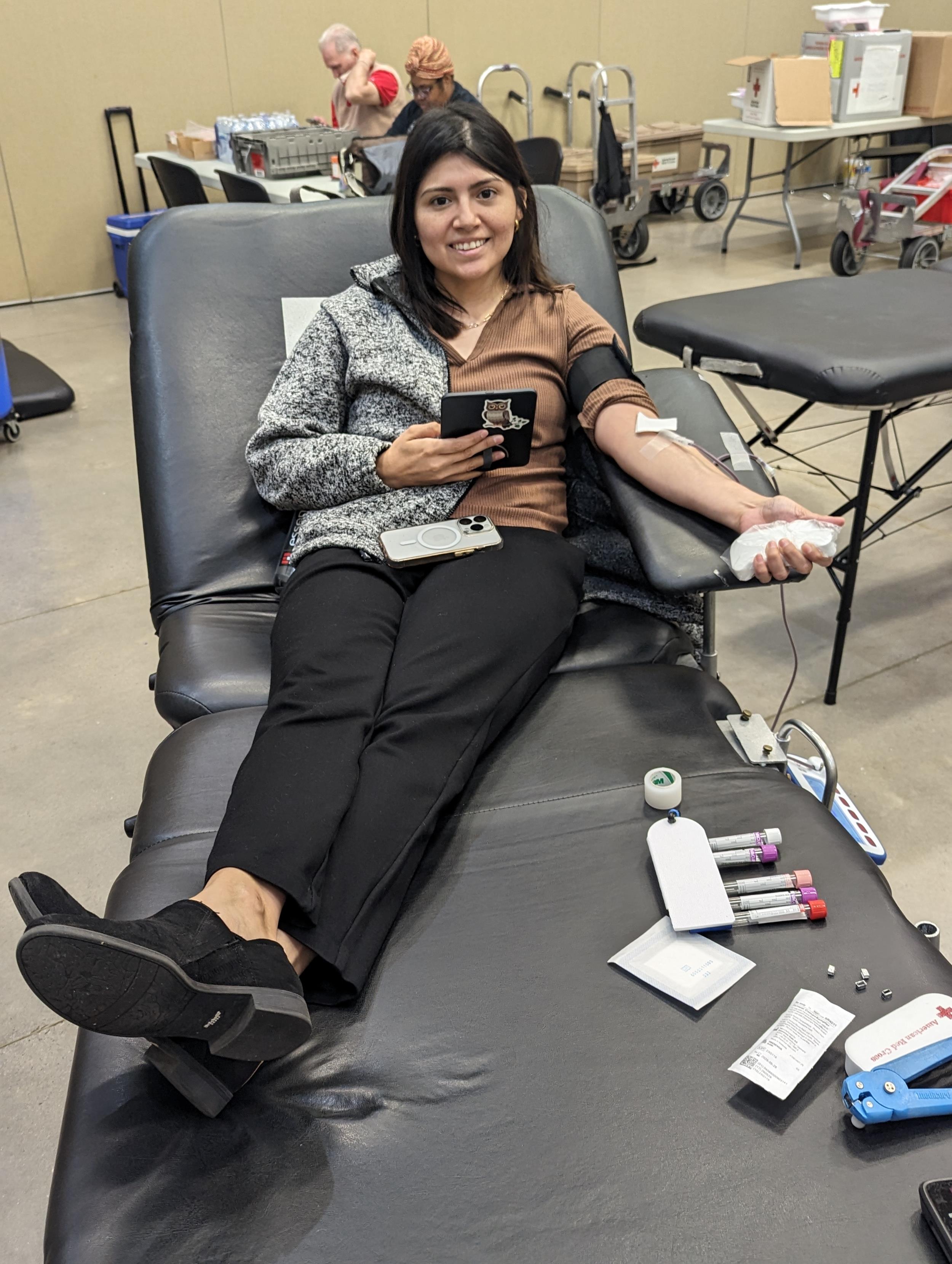 Chatham County employee Jessica Salgado donates blood at the County blood drive in Pittsboro on April 17.