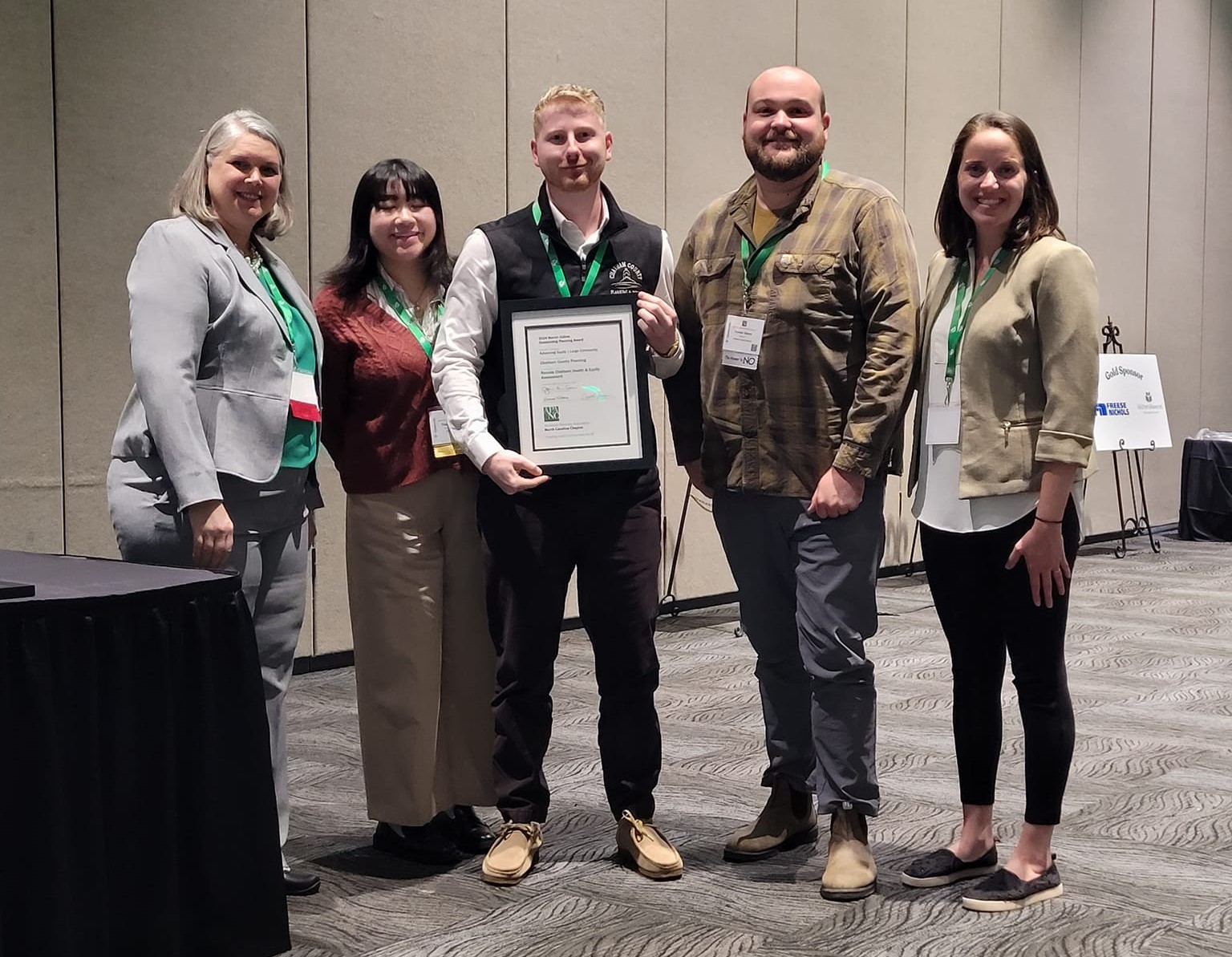 Thanh Schado, Chance Mullis, and Hunter Glenn, with the Chatham County Planning Department, accepted the 2024 North Carolina Marvin Collins Award in the “Advancing Equity” category by the North Carolina Chapter of the American Planning Association on October 16 in Greenville, NC.