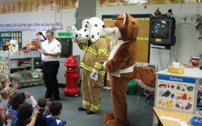 Red Fox and Sparky are characters that teach kids about 911 and fire safety